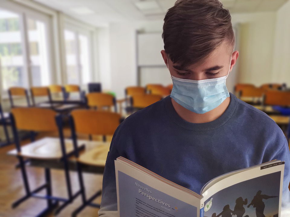 student ve třídě